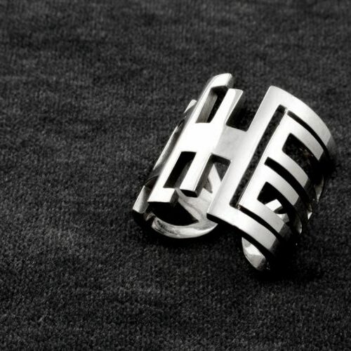 Anello a fascione traforato in argento. Capello - Torino
