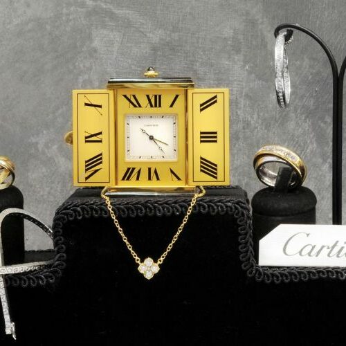 Vari gioielli in oro, platino e brillanti. Cartier