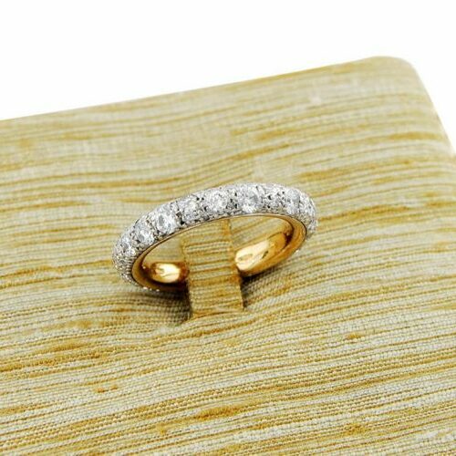 Anello oro rosa e argento recante diamanti della serie "Tango". Pomellato