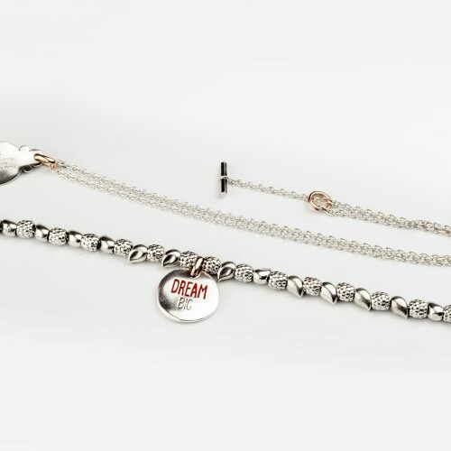 Collana e bracciale in argento e smalti. Queriot