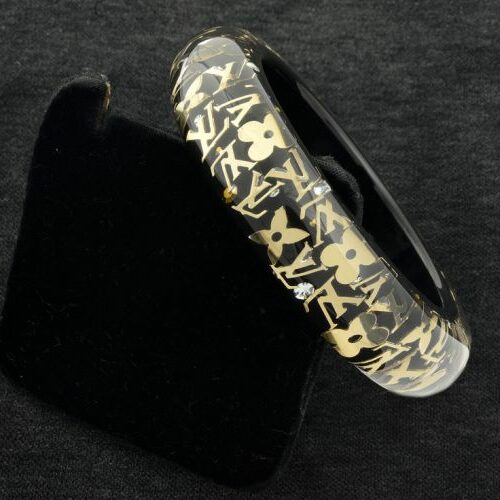 Bracciale in materiale plastico. Yves Saint Laurent